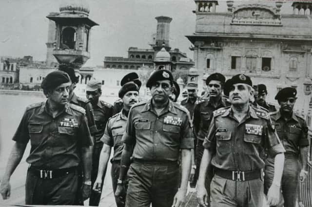 Senior army officers at the site of the military operation. Picture:  Getty
