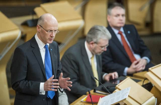 John Swinney has called for backing for his budget. Picture: PA