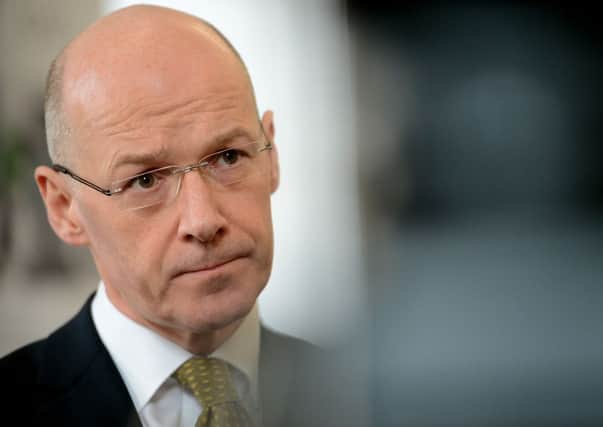 John Swinney:'This is about mitigation - about picking up the pieces from Westminsters iniquitous policy.' Picture: Neil Hanna