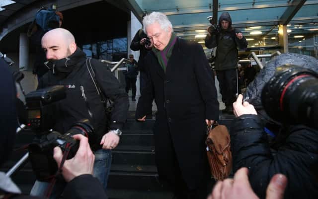 Sean Fitzpatrick, the former chairman of Anglo Irish Bank, leaves the Circuit Criminal Court. Picture PA