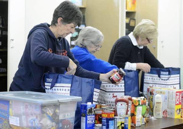 Food banks in Scotland are now used by around 55,000, MSPs heard today. Picture: Neil Hanna