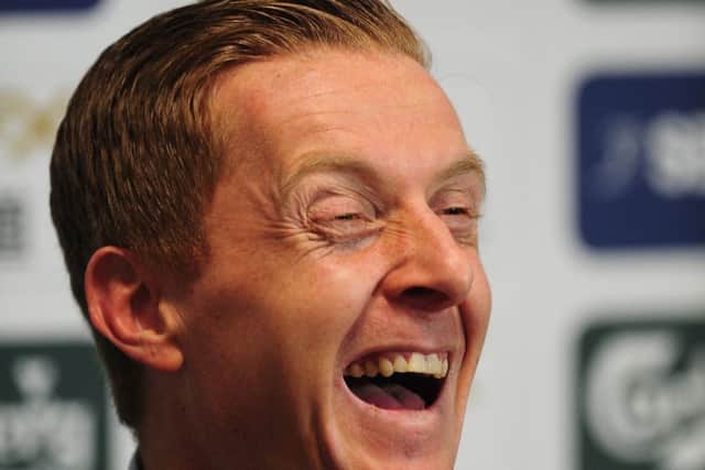 Garry Monk, Swansea Citys caretaker manager following Michael Laudrups exit, raises a smile as he faces the media. Picture: Getty
