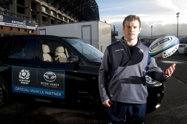 Glasgow flanker Chris Fusaro poses alongside one of the new fleet of cars presented to Scottish Rugby by new partners Peter Vardy Ltd. Fusaro takes on England tomorrow. Picture: Craig Watson/SNS/SRU