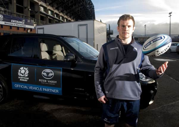 Glasgow flanker Chris Fusaro poses alongside one of the new fleet of cars presented to Scottish Rugby by new partners Peter Vardy Ltd. Fusaro takes on England tomorrow. Picture: Craig Watson/SNS/SRU