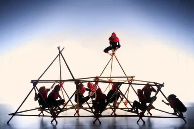 The ten dancers in Kingdom use 80 bamboo sticks and 120 pieces of rope to build a six-metre human shelter