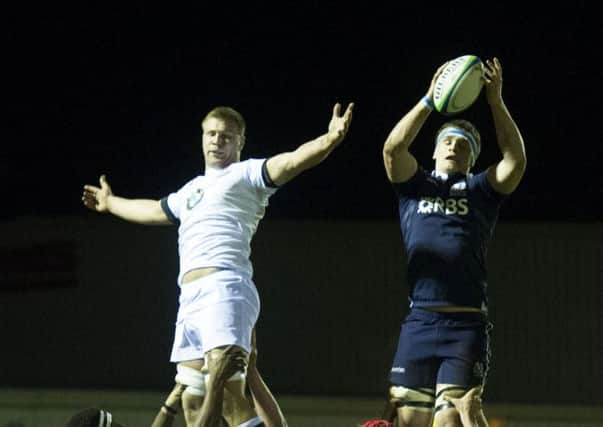 Scotland's Magnus Bradbury (right) wins the ball from a line out. Picture: SNS
