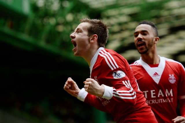Peter Pawlett celebrates after scoring to put Aberdeen in front. Picture: SNS