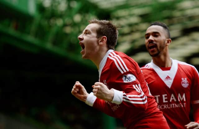 Peter Pawlett celebrates after scoring to put Aberdeen in front. Picture: SNS