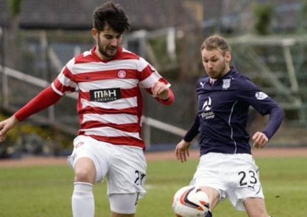 Hamilton's Jesus Garcia Tena goes up against Dundee's Martin Boyle. Picture: SNS