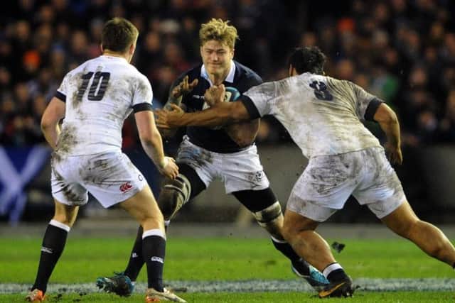 David Denton takes on the English defence. Picture: Jane Barlow