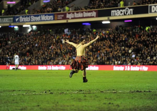 A kilted streaker, who showed more verve than most of the Scottish backs. Picture: Jane Barlow