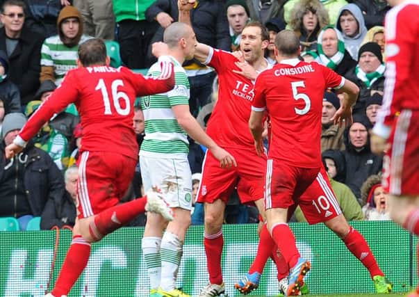 Russell Anderson celebrates his equaliser at Parkhead on Saturday. Picture: Robert Perry