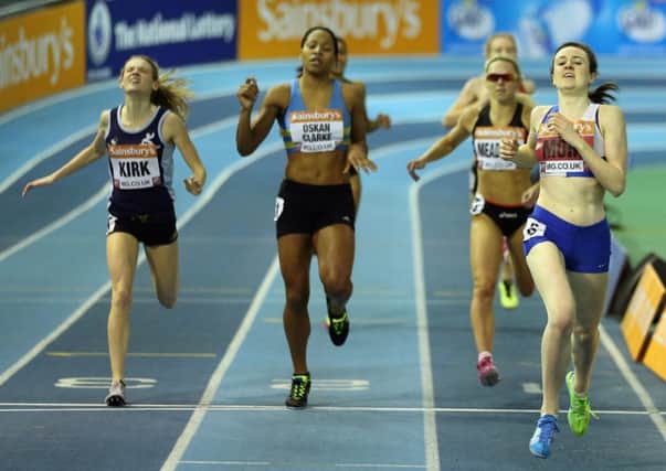 Laura Muir, right, crosses the line first to win the womens 800 metres final. Picture: Getty Images