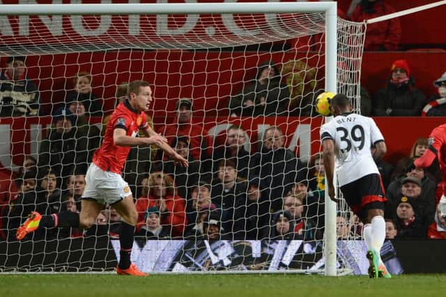Nemanja Vidic looks on in horror as Darren Bent nods home at the death. Picture: Getty