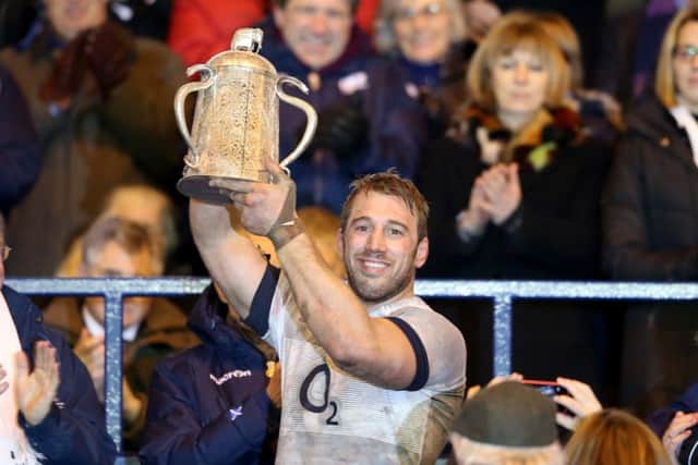 Chris Robshaw, the England captain, raises the Calcutta Cup at Murrayfield. Picture: Getty
