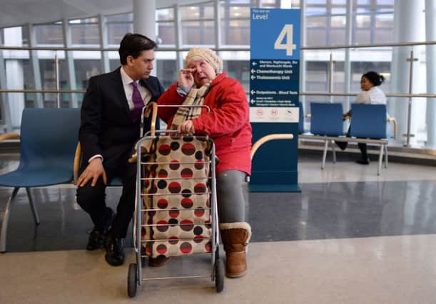Labour leader Ed Miliband meets hospital patient Linda Garrod. Picture: PA