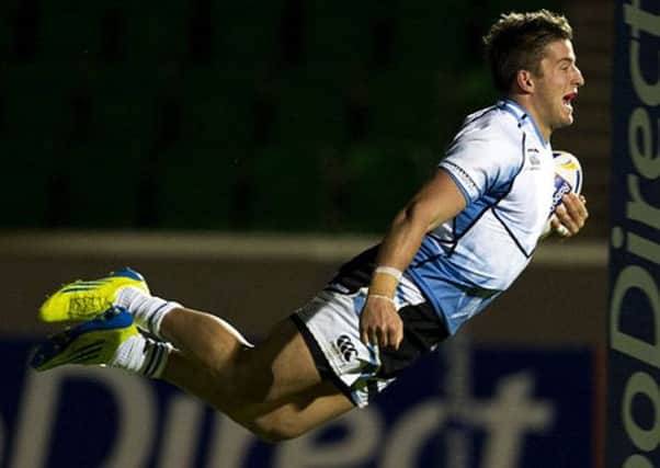 DTH van der Merwe pictured scoring a try for Glasgow Warriors. The Canadian has been ruled out for six months. Picture: SNS