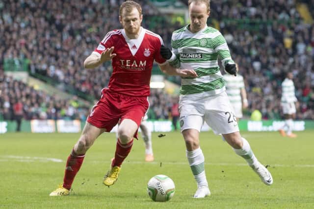 Mark Reynolds, left, has electric pace according to the ex-Dons coach. Picture: PA