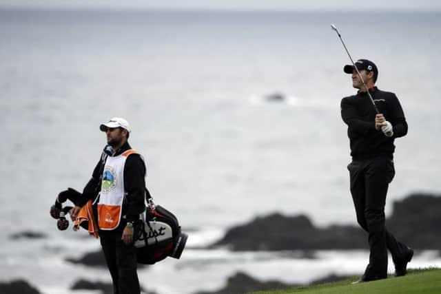 Jimmy Walker, right, during the final round at Pebble Beach. Picture: AP