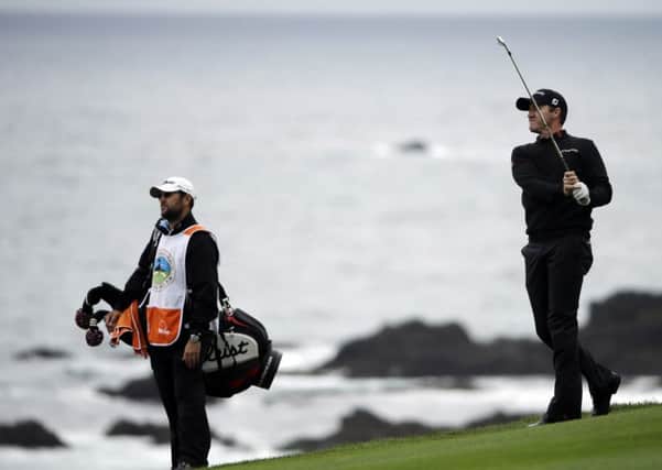 Jimmy Walker, right, during the final round at Pebble Beach. Picture: AP