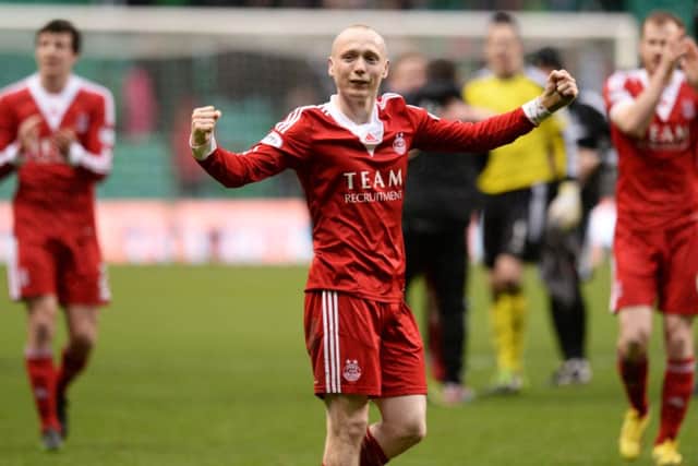 Willo Flood celebrates victory at Celtic Park. Picture: SNS