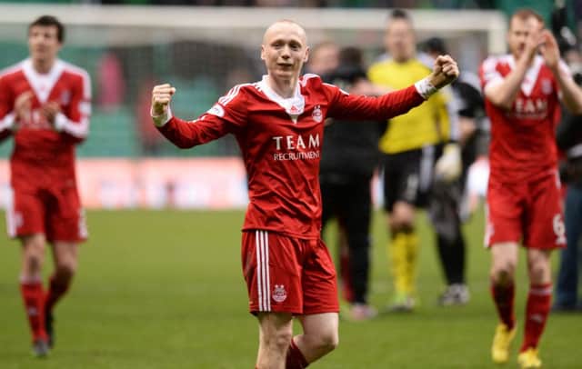 Willo Flood celebrates victory at Celtic Park. Picture: SNS
