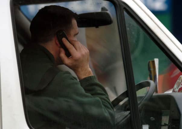 Police in the Highlands are cracking down on drivers who use mobile phones at the wheel. Picture: TSPL