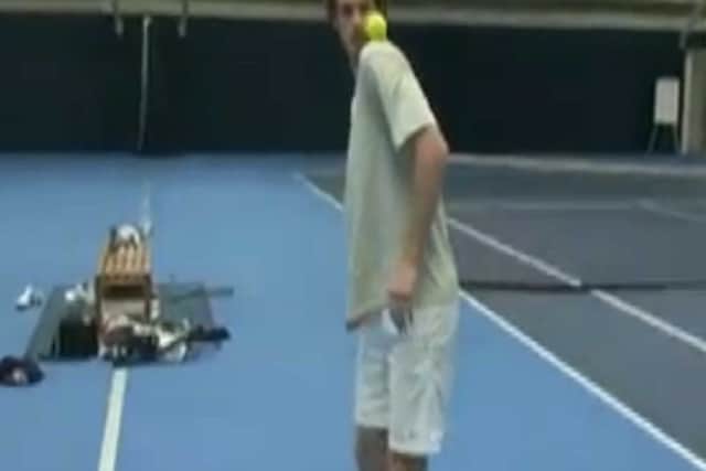 Andy Murray plays keepy-up with a tennis ball