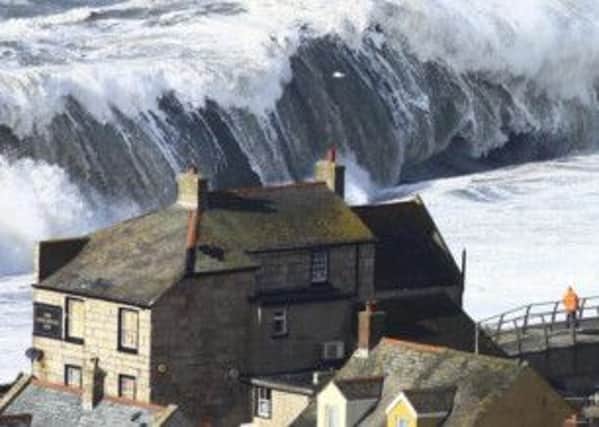 Huge waves batter the coastline at Chiswell in Dorset. Picture: Richard Broome