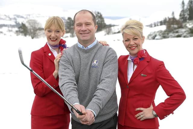 Tartan Tour No1 Greig Hutcheon with Virgins Nicola Lee and Louise Dickson. Picture: Andy Forman