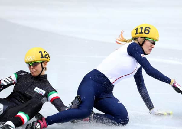 Elise Christie of Great Britain (R) falls and collides with Arianna Fontana of Italy. Picture: Getty
