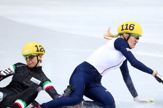 Elise Christie of Great Britain (R) falls and collides with Arianna Fontana of Italy. Picture: Getty