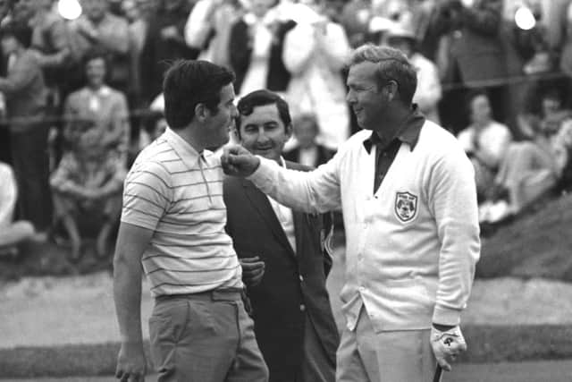 Arnold Palmer givesHarry Bannerman a friendly tap on the chin after tying their on Saturday morning, Sep 18, 1971 in St Louis. Picture: AP