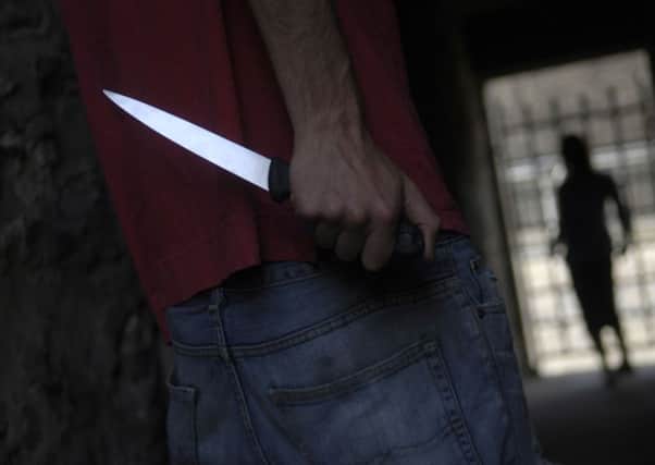 Knife crime in Scotland's biggest city has dropped by almost two thirds. Picture: TSPL