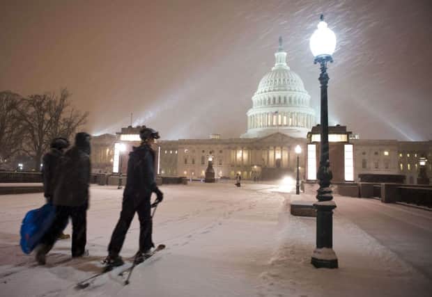 A man takes to his skis outside the US Congress in Washington. Picture: Getty