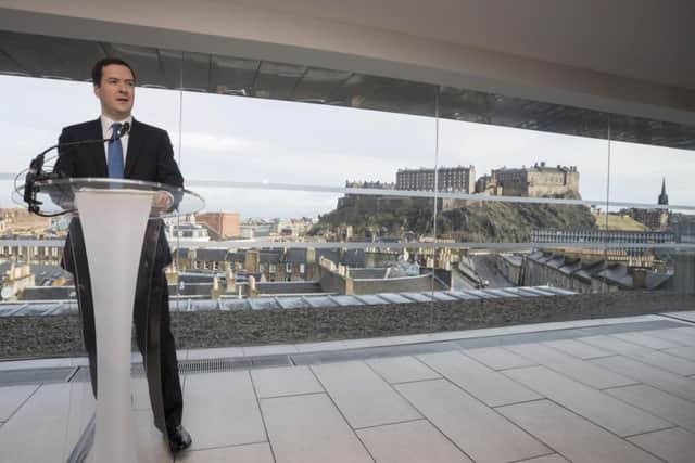 Against the backdrop of Edinburgh Castle, Chancellor George Osborne delivers his speech. Picture: Reuters