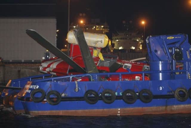 The wreckage of the Super Puma being taken away. Picture: Newsline Scotland