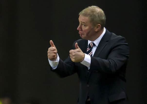 Ally McCoist believes Rangers fans should be happy despite the club's struggle to restore the good times. Picture: SNS