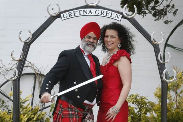 Amerjit and Sarah Walia tie the knot at Gretna Green. Picture: Getty