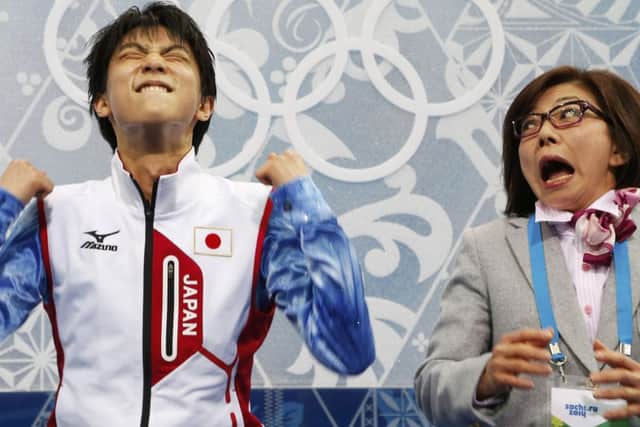 Yuzuru Hanyu and Japan figure skating coach Yoshiko Kobayashi show their emotions after learning of his gold medal success      Picture: Reuters