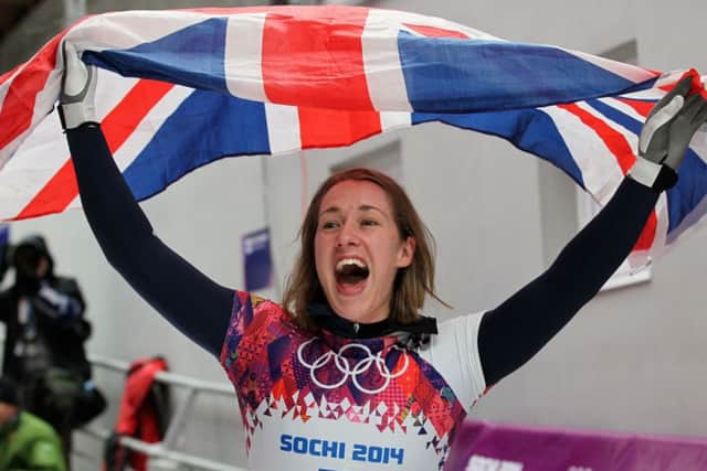 Great Britain's Lizzy Yarnold celebrates winning Gold in the Women's Skeleton Final. Picture: PA