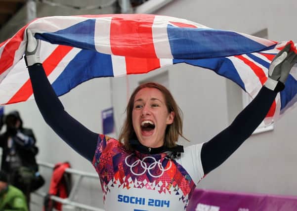 Great Britain's Lizzy Yarnold celebrates winning Gold in the Women's Skeleton Final. Picture: PA