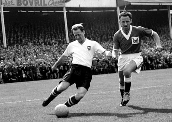 Tom Finney, left, takes on Geoff Thomas. Picture: Getty