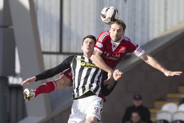 Steven Thompson battles with Aberdeen's Russell Anderson. Picture: PA