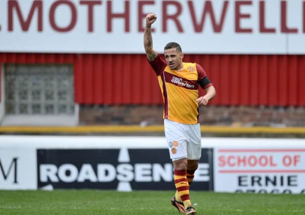 Motherwell's Lionel Ainsworth celebrates after scoring his side's second goal of the game. Picture: SNS