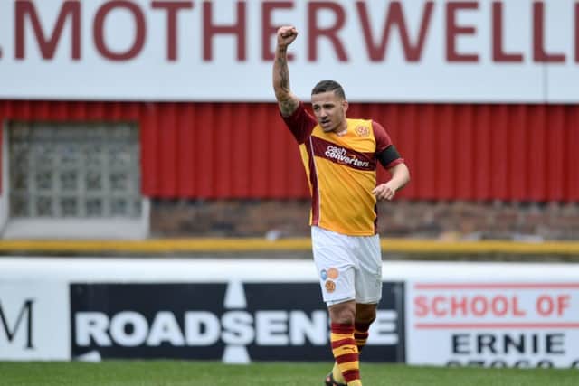 Motherwell's Lionel Ainsworth celebrates after scoring his side's second goal of the game. Picture: SNS