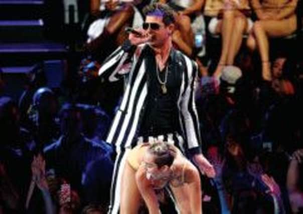 Children are being exposed to an increasingly sexualised TV diet of pop performers such as Miley Cyrus, above. Picture: Getty