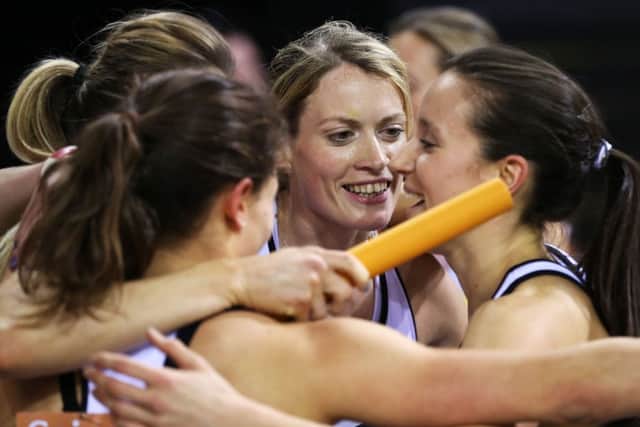 Eilidh Child, centre, congratulates her Scotland relay team-mates in Glasgow last month. Picture: PA