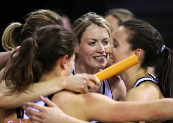 Eilidh Child, centre, congratulates her Scotland relay team-mates in Glasgow last month. Picture: PA