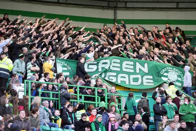 Celtic fans unfurl a Green Brigade banner during the match against St Johnstone at Celtic Park. Picture: SNS